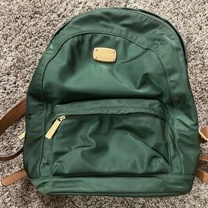 Small green MK backpack